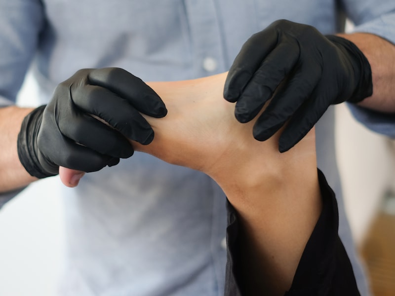 Hands performing soft tissue therapy